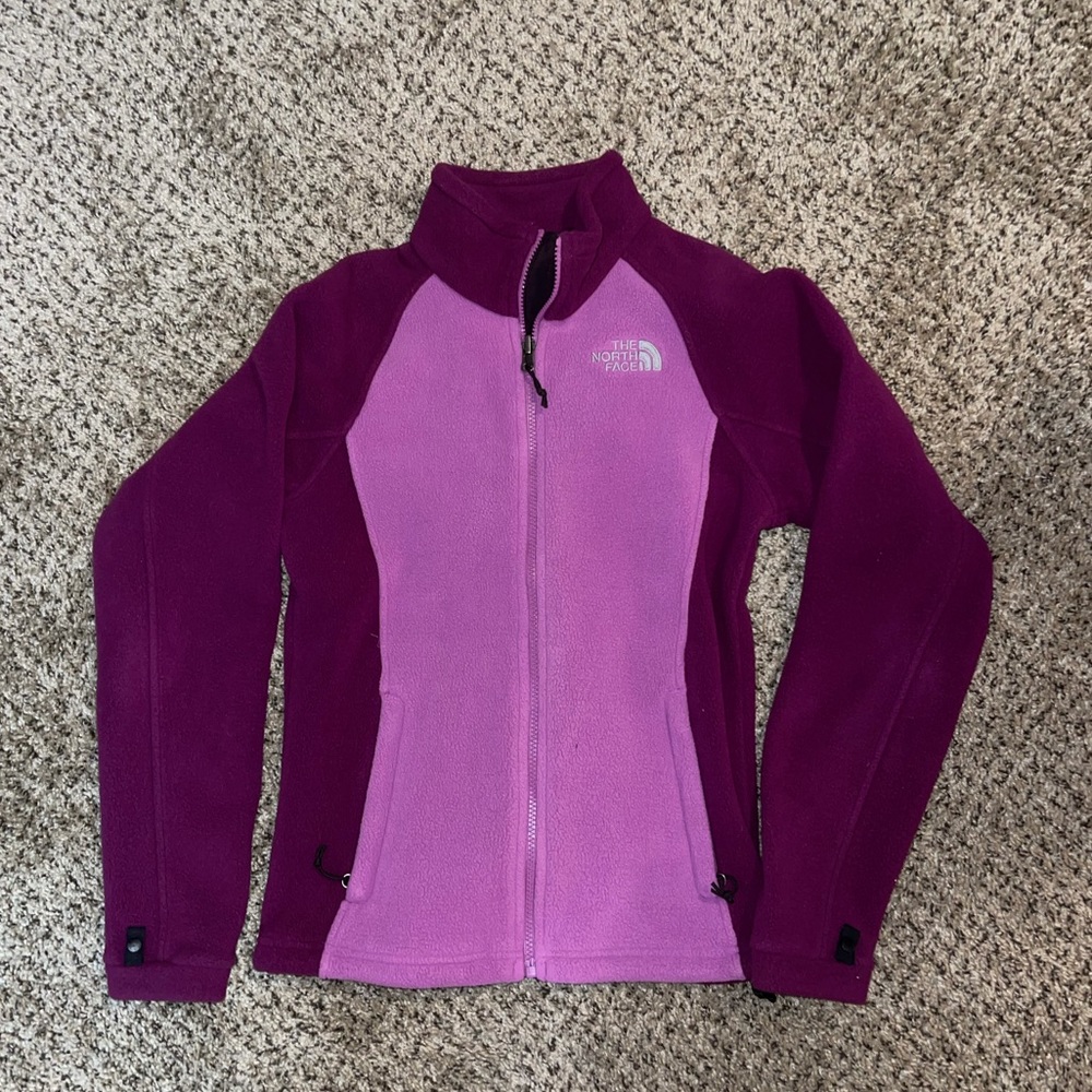 women’s North Face zip-up jacket